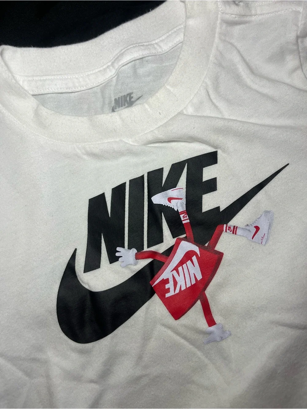 Nike White Kids Short Sleeve Tee with Black Logo and Red Graphic